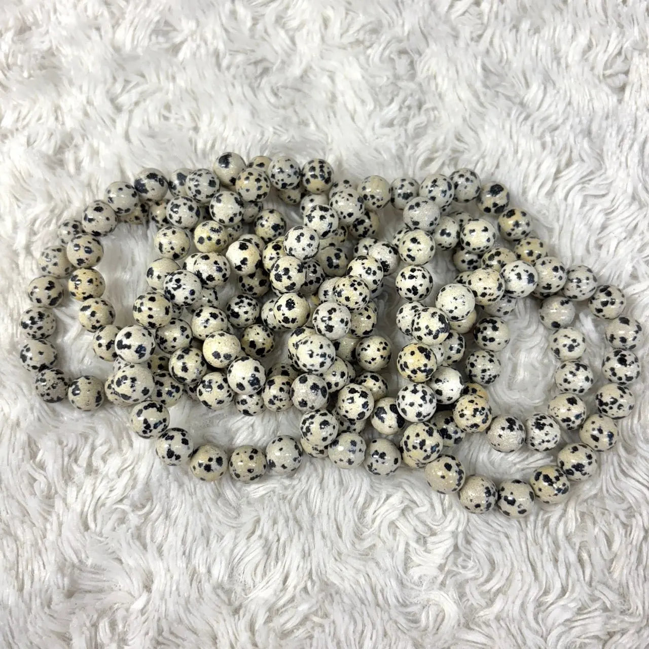 Dalmatian jaspis - Rannekoru - Tuo iloa ja kepeyttä elämään - Valkoisen Liekin Voima