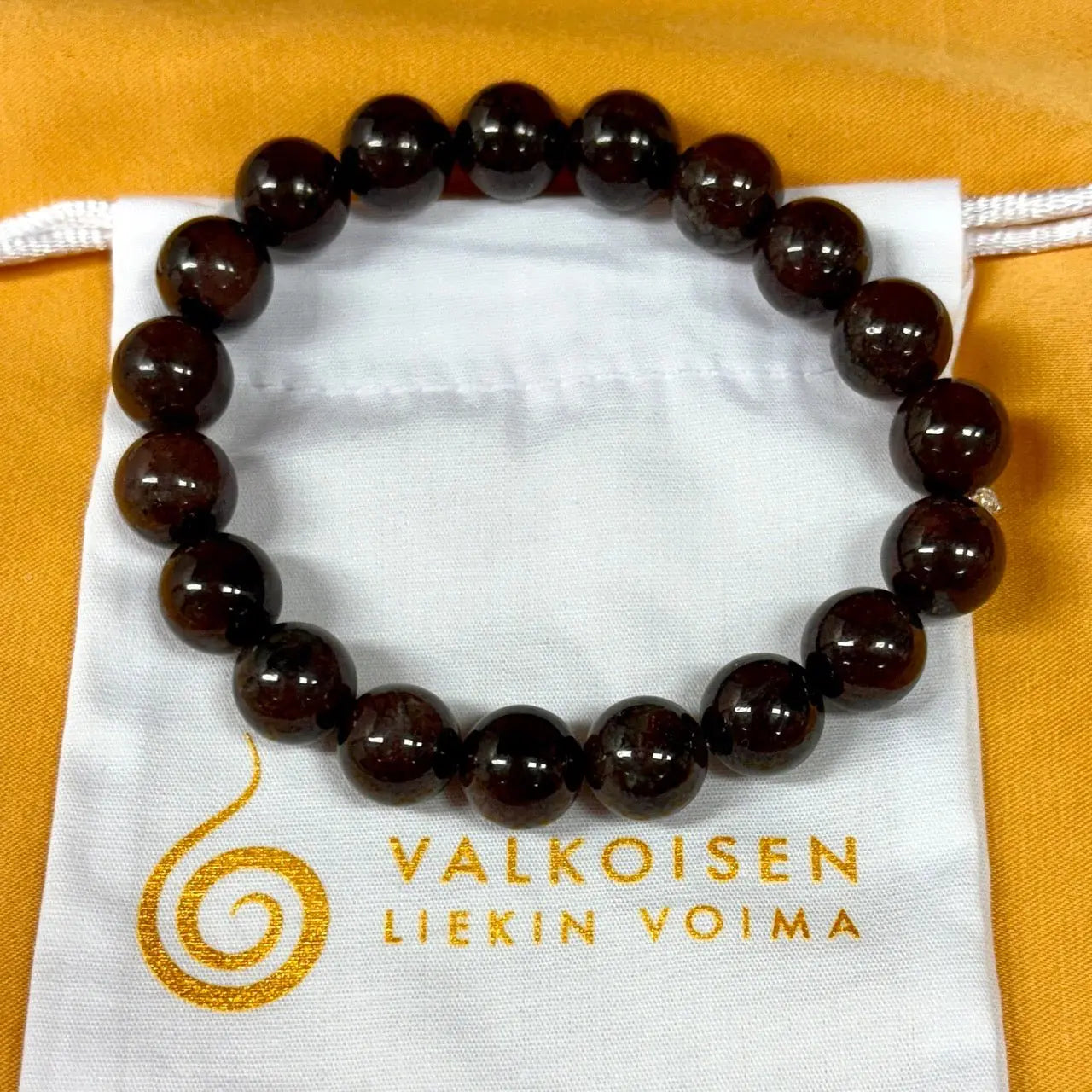 Granaatti - Rannekoru - Luo ympärillesi suojakilven joka pitää sinut omassa voimassasi - Valkoisen Liekin Voima