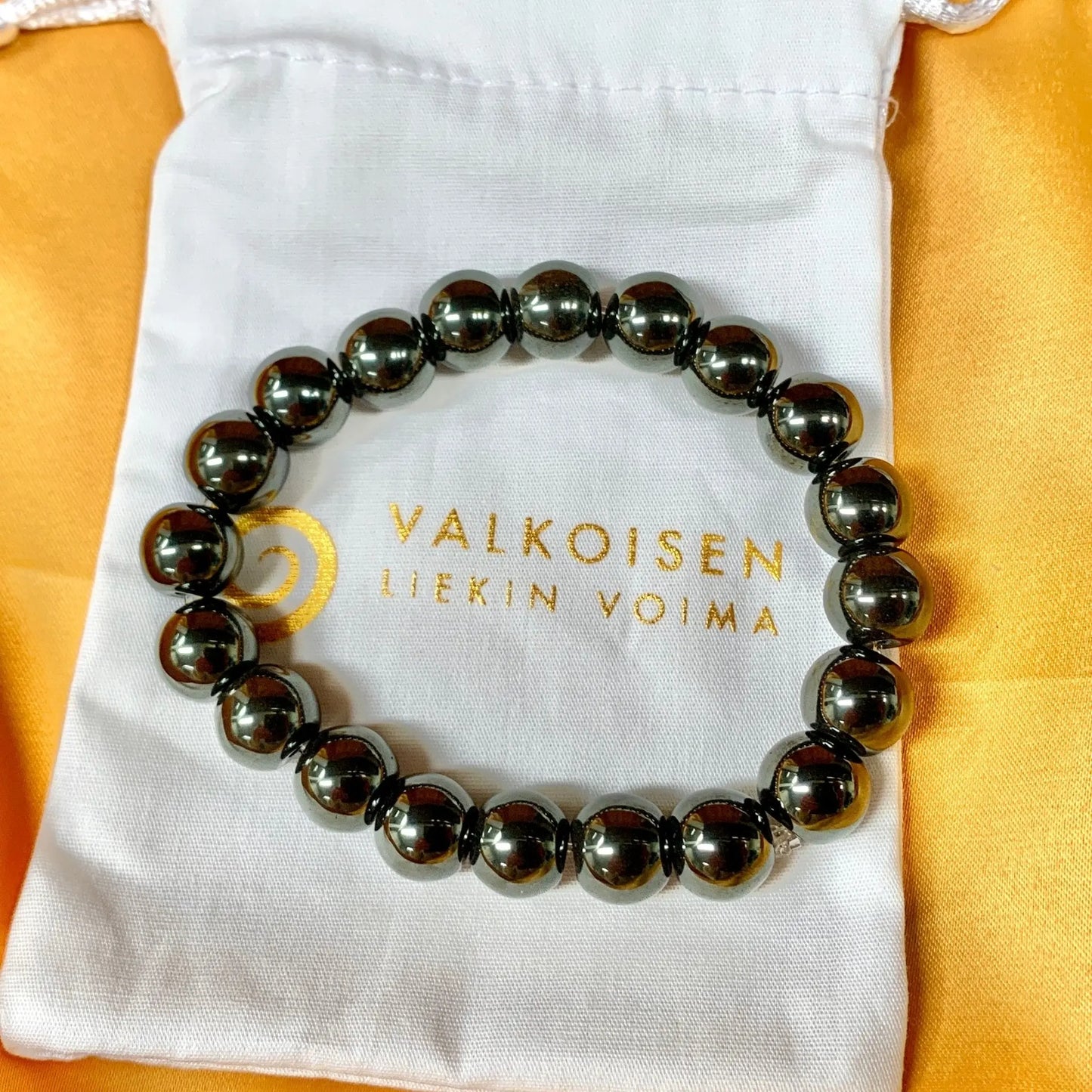 Hematiitti - Rannekoru - Antaa virtaa väsyneelle keholle ja auttaa keskittymään - Valkoisen Liekin Voima