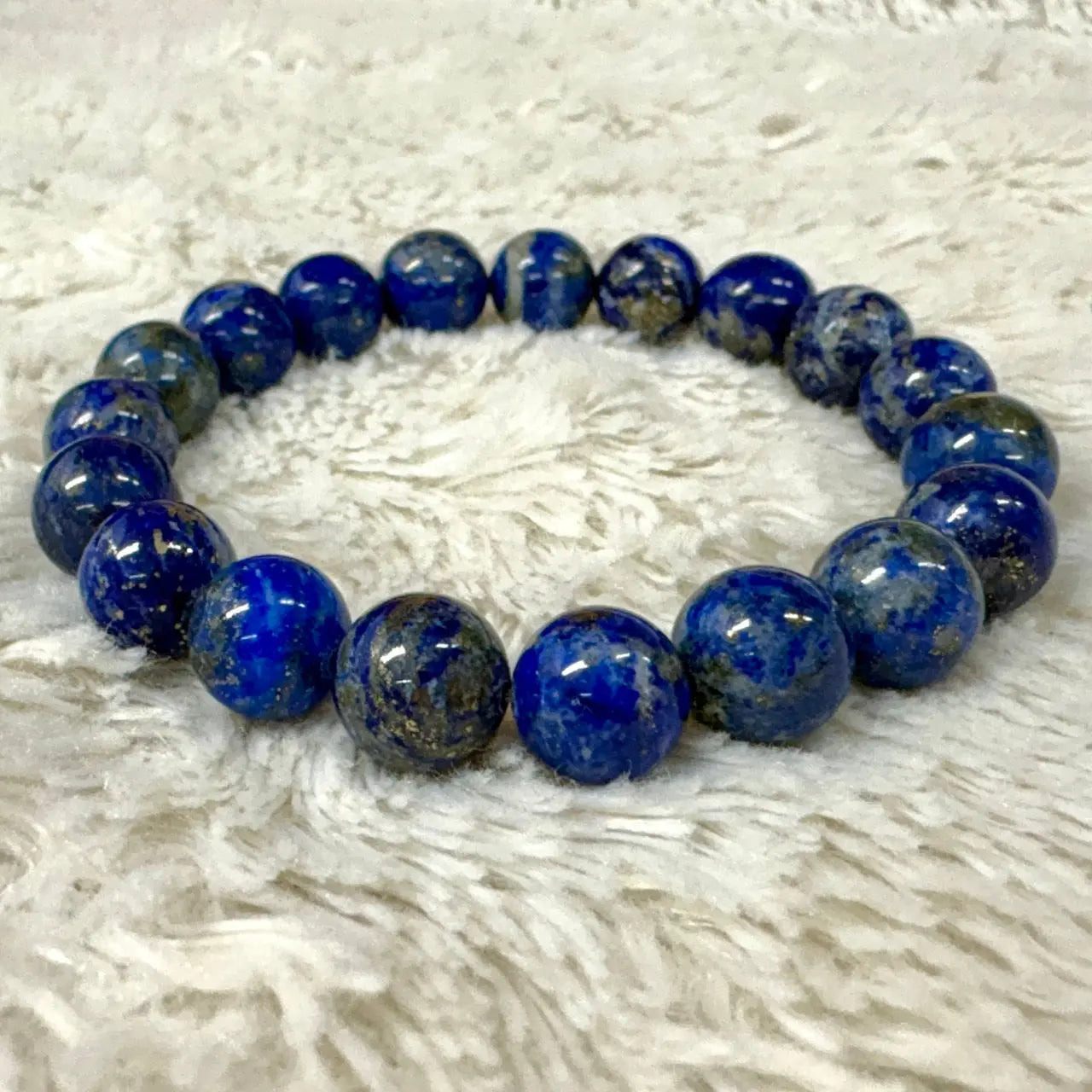 Lapis latsuli - Rannekoru - Suojelee, poistaa pelkoja, katkaisee negatiiviset sidokset Valkoisen Liekin Voima