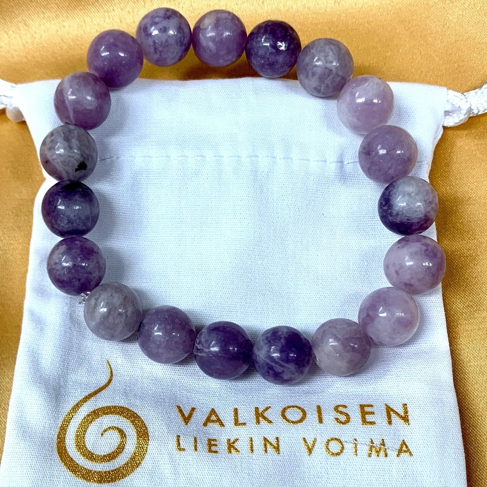 Lepidoliitti - Rannekoru - Auttaa levottomuuteen ja tunnekuohuihin, rauhoittaa hermostoa - Valkoisen Liekin Voima