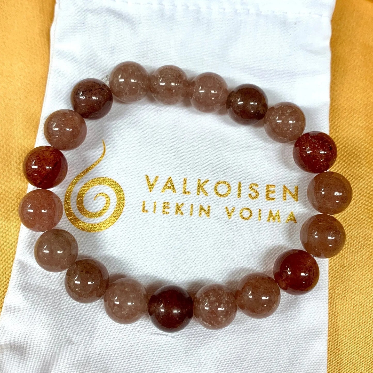 Mansikkakvartsi - Rannekoru - Herättelee sydämen unelmat ja auttaa kulkemaan niitä kohti - Valkoisen Liekin Voima