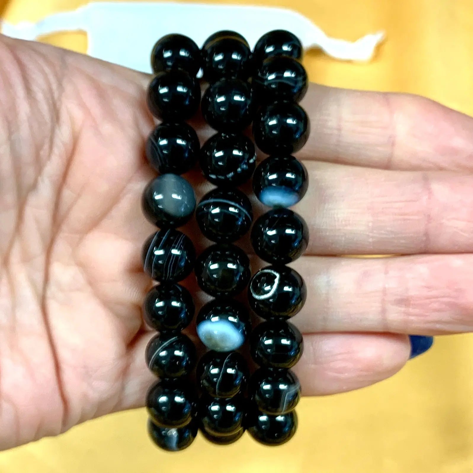 Musta raita - akaatti - Rannekoru - Kohottaa kehon värähtelyä, tuo hyvät yöunet - Valkoisen Liekin Voima