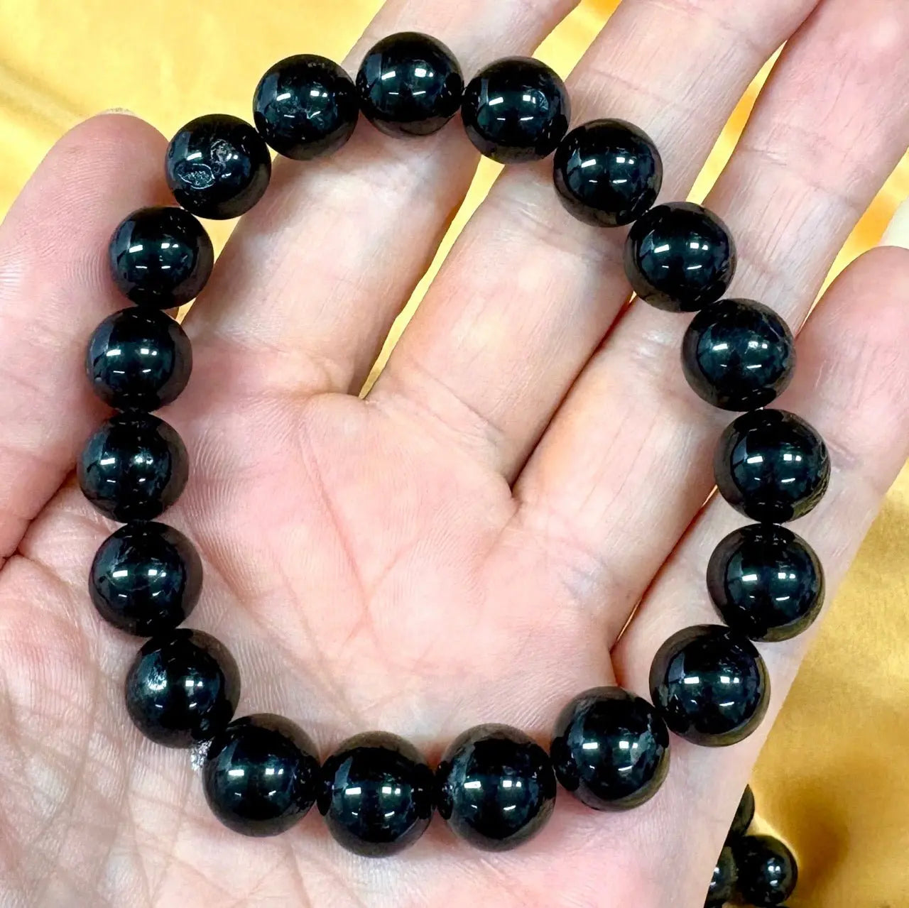 Musta turmaliini - Rannekoru - Suojeleva koru, joka imee negatiivisuuden ja tuo rauhan - Valkoisen Liekin Voima