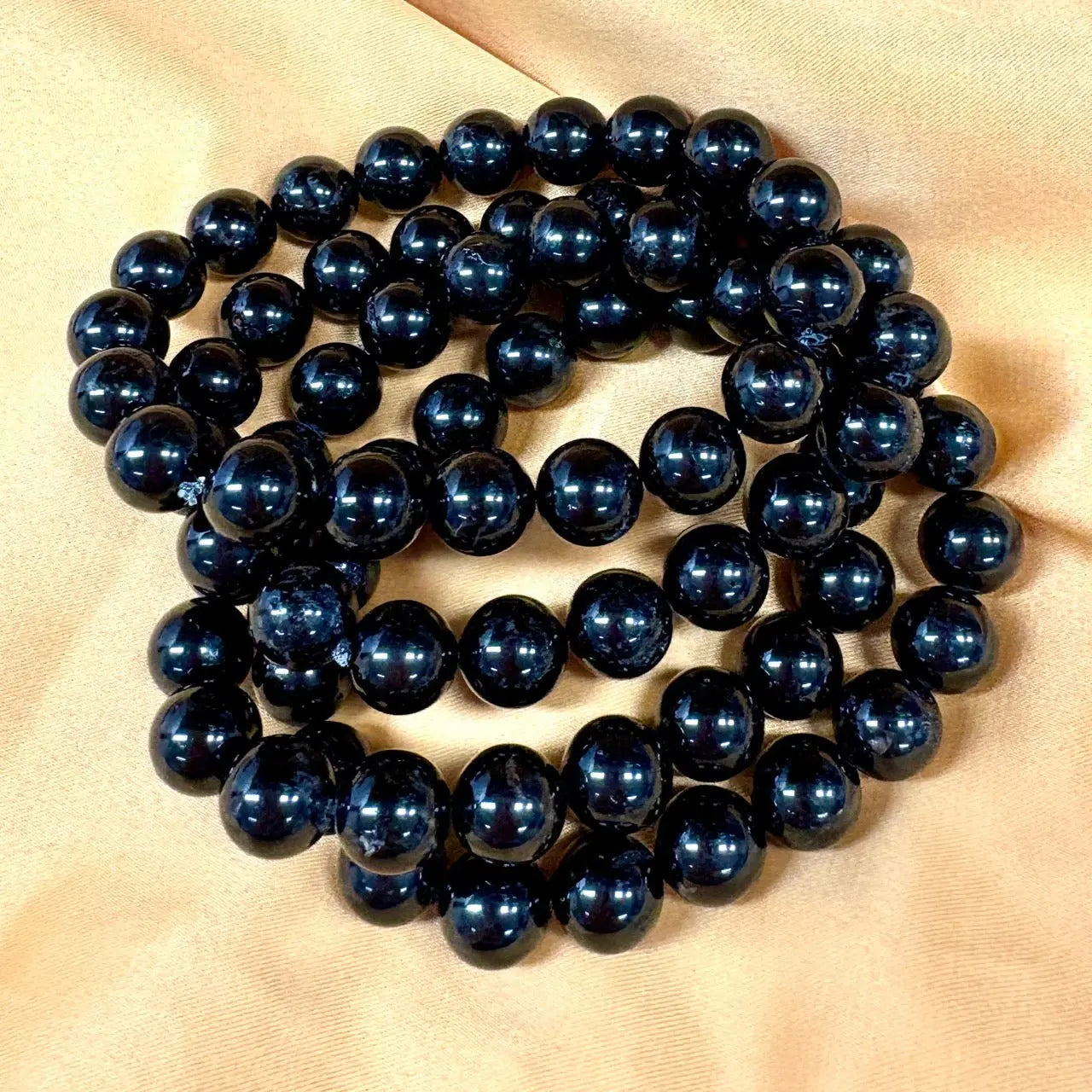 Musta turmaliini - Rannekoru - Suojeleva koru, joka imee negatiivisuuden ja tuo rauhan - Valkoisen Liekin Voima