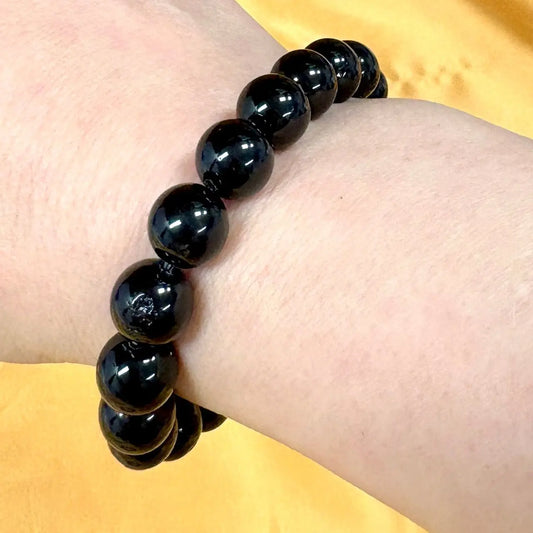 Musta turmaliini - Rannekoru - Suojeleva koru, joka imee negatiivisuuden ja tuo rauhan - Valkoisen Liekin Voima