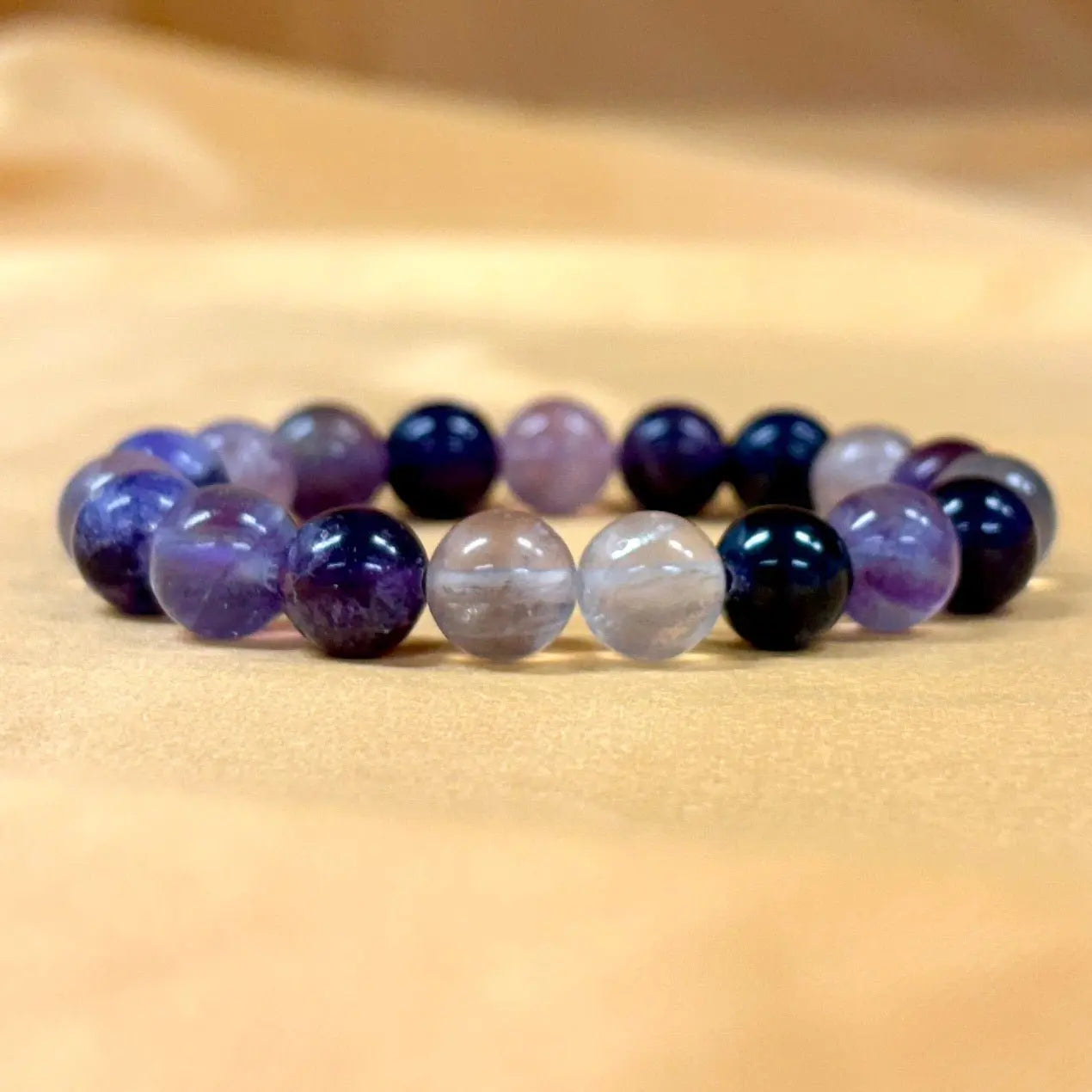 Purppurafluoriitti - Rannekoru - Auttaa päästämään irti jumiutuneista ajatusmalleista - Valkoisen Liekin Voima