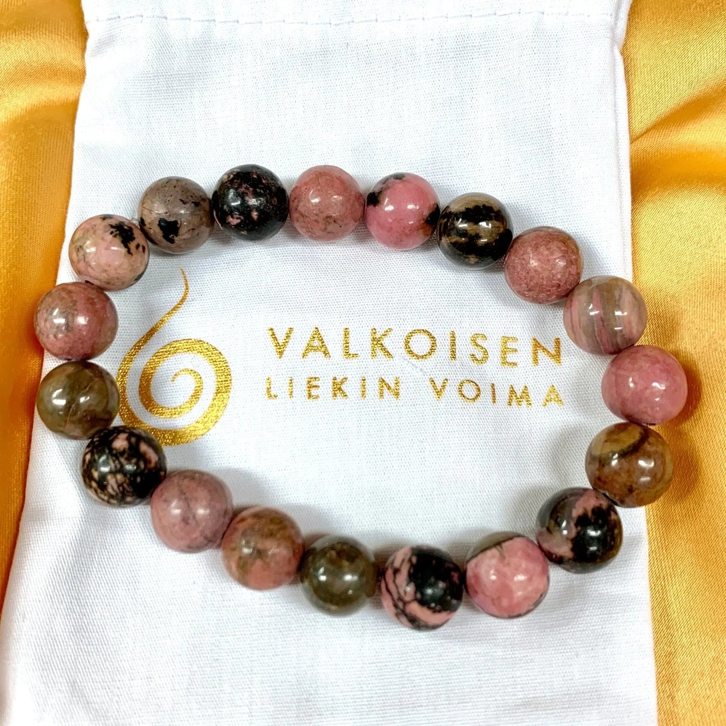 Rodoniitti - Rannekoru - Auttaa sydänsuruissa, eheyttää ihmissuhteita - Valkoisen Liekin Voima