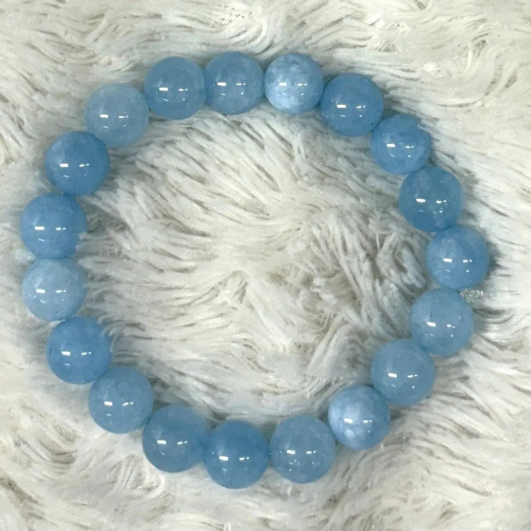 Sininen kalsedoni - Rannekoru - Lievittää stressiä, ahdistusta, jännitystä ja hermostuneisuutta - Valkoisen Liekin Voima