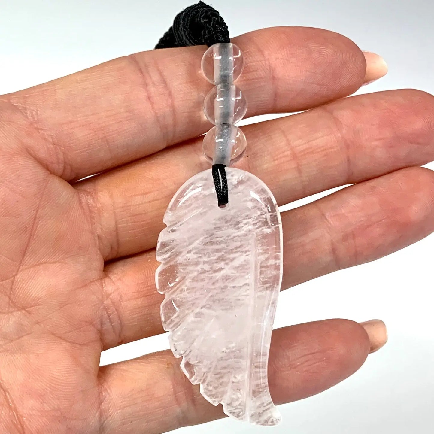 Vuorikristalli - Enkelinsiipikaulakoru - Opastusta, puhdistusta, mielen selkeyttä - Valkoisen Liekin Voima