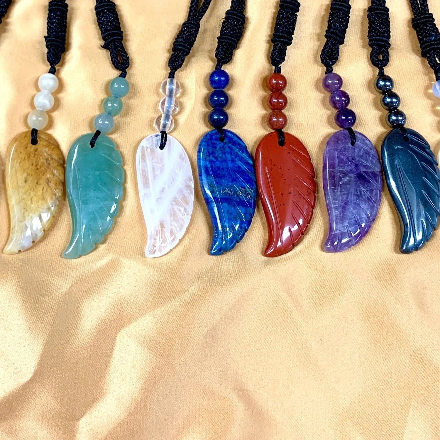 Enkelinsiipi-kaulakorut - Valkoisen Liekin Voima