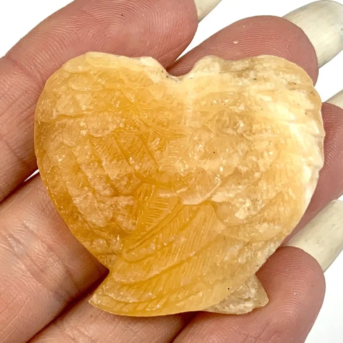 Oranssi kalsiitti - Valkoisen Liekin Voima