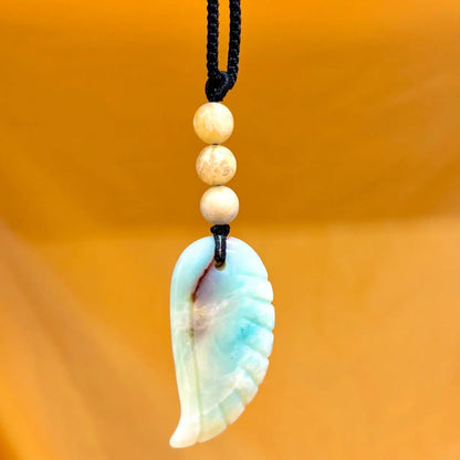 Amatsoniitti - Enkelinsiipikaulakoru - Rauhoittaa hermostoa ja tuo äidinrakkautta - Valkoisen Liekin Voima