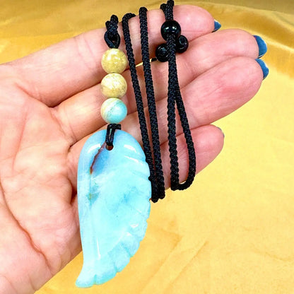 Amatsoniitti - Enkelinsiipikaulakoru - Rauhoittaa hermostoa ja tuo äidinrakkautta - Valkoisen Liekin Voima