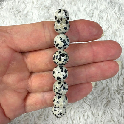 Dalmatian jaspis - Rannekoru - Tuo iloa ja kepeyttä elämään - Valkoisen Liekin Voima