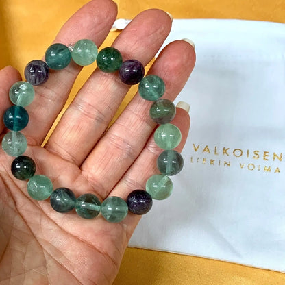 Sateenkaarifluoriitti - Rannekoru - Vapauttaa riippuvuuksista ja turhasta tunnekuormasta - Valkoisen Liekin Voima