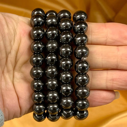 Hematiitti - Rannekoru - Antaa virtaa väsyneelle keholle ja auttaa keskittymään - Valkoisen Liekin Voima