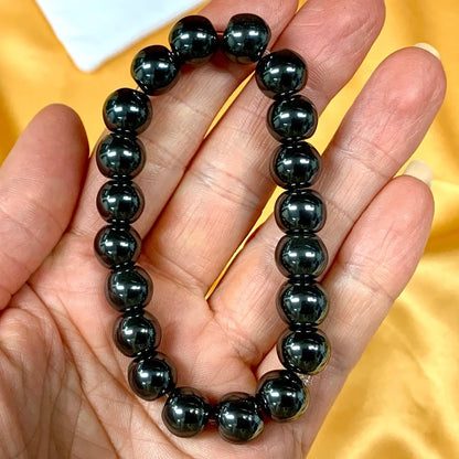 Hematiitti - Rannekoru - Antaa virtaa väsyneelle keholle ja auttaa keskittymään - Valkoisen Liekin Voima