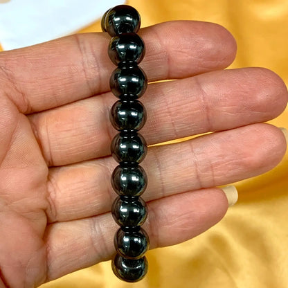 Hematiitti - Rannekoru - Antaa virtaa väsyneelle keholle ja auttaa keskittymään - Valkoisen Liekin Voima