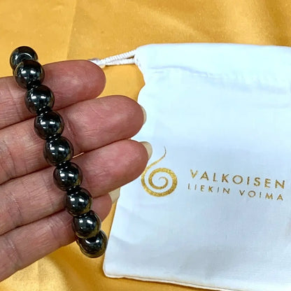 Hematiitti - Rannekoru - Antaa virtaa väsyneelle keholle ja auttaa keskittymään - Valkoisen Liekin Voima