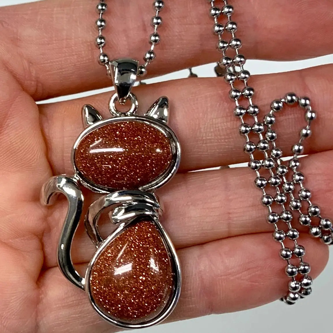 Kissakaulakoru - Kultainen hiekkakivi 4,5cm + ketju 60cm - Valkoisen Liekin Voima