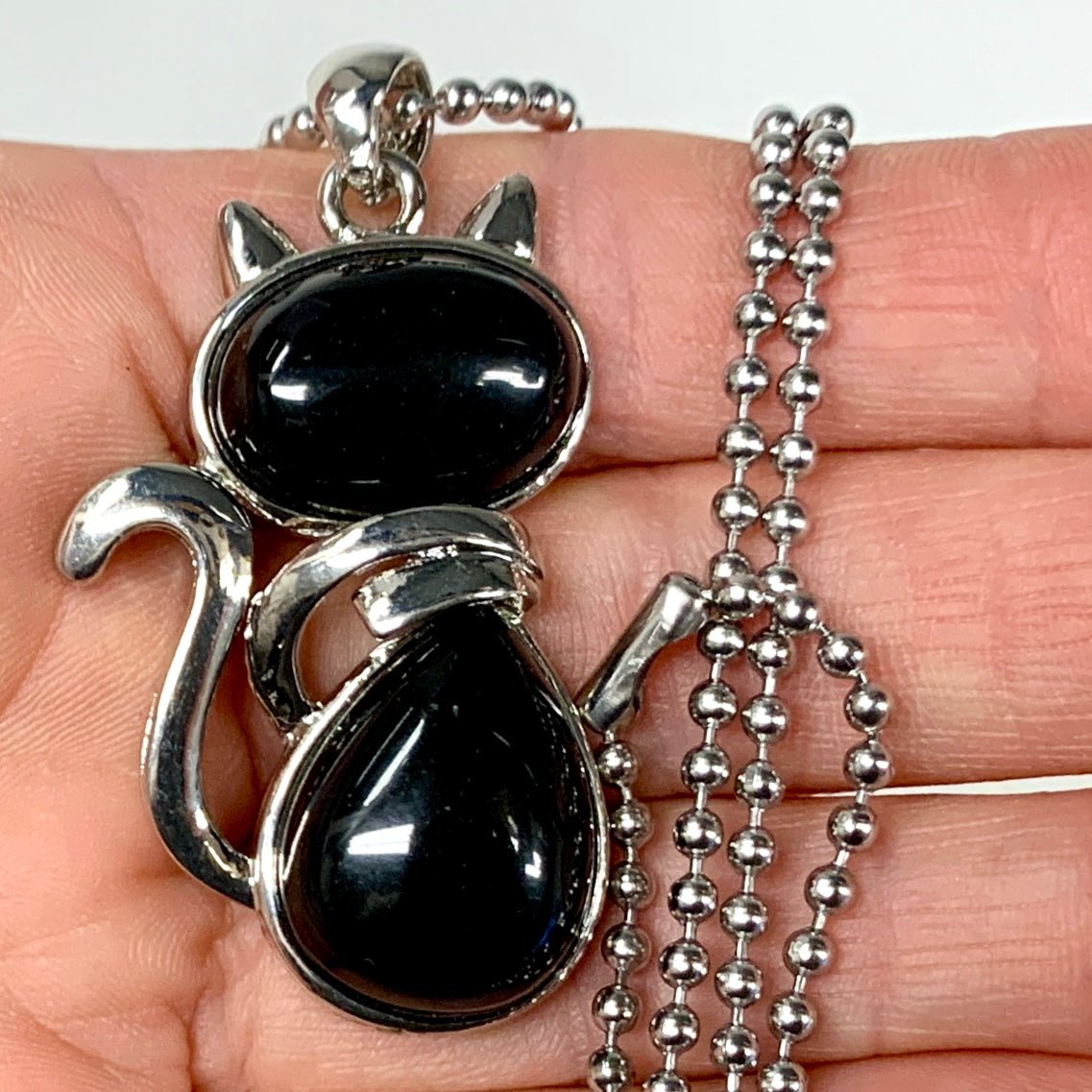 Kissakaulakoru - Musta obsidiaani 4,5cm + ketju 60cm - Valkoisen Liekin Voima