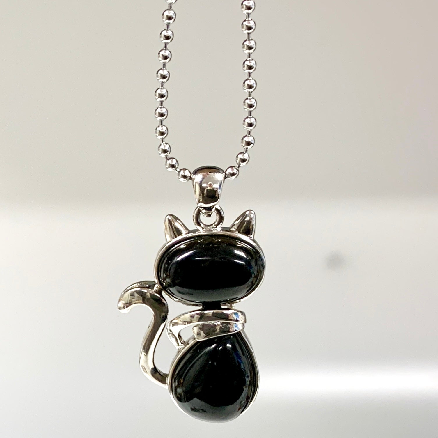 Kissakaulakoru - Musta obsidiaani 4,5cm + ketju 60cm - Valkoisen Liekin Voima