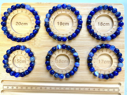 Kuninkaallisen sininen akaatti - Rannekoru - Poistaa pelkoja, luo ympärillesi suojakilven, voimaannuttaa Valkoisen Liekin Voima