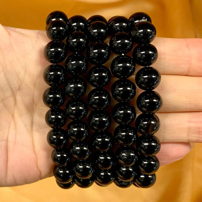 Musta obsidiaani – Rannekoru – Vapauttaa sisäisiä lukkoja ja suojaa energioitasi - Valkoisen Liekin Voima