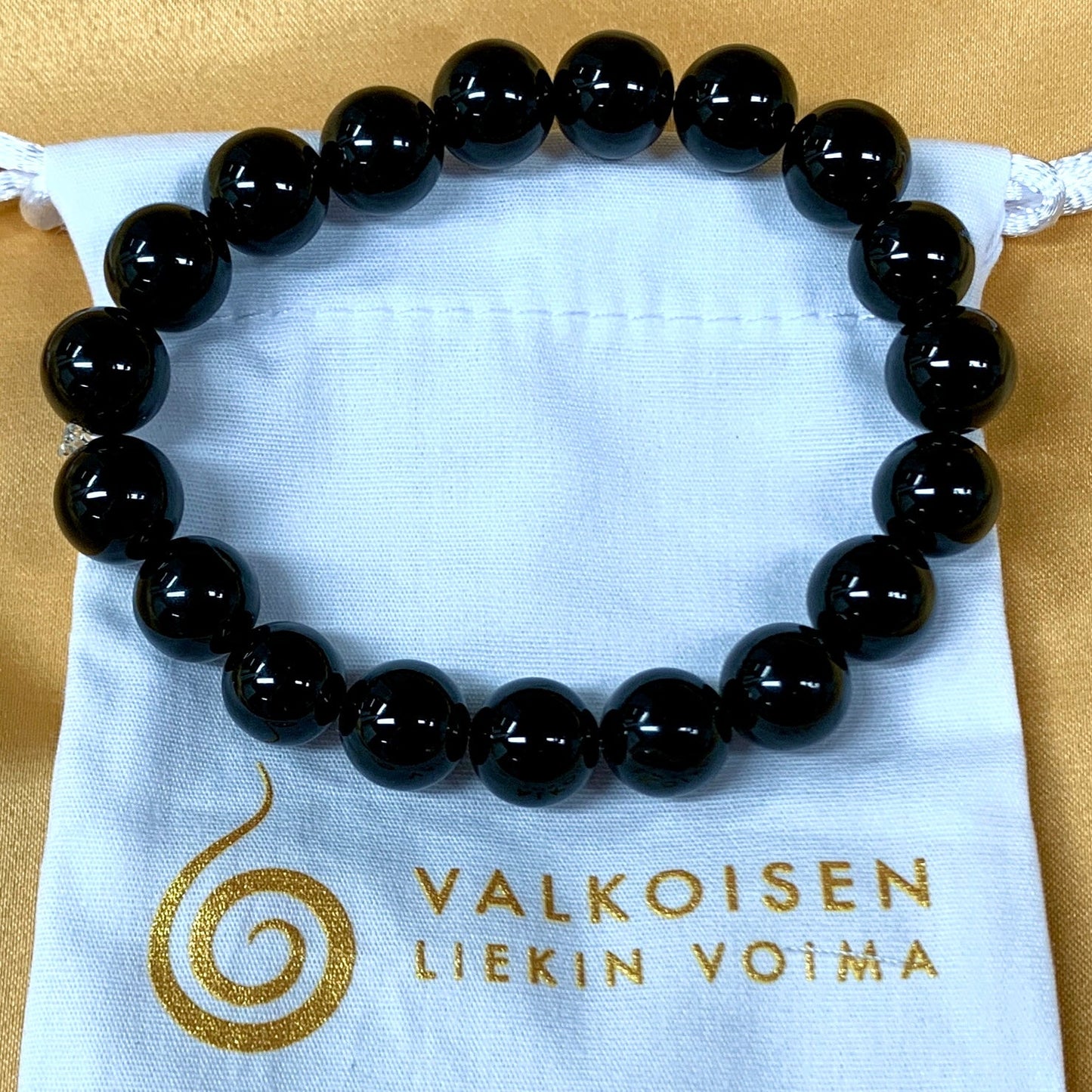 Musta obsidiaani – Rannekoru – Vapauttaa sisäisiä lukkoja ja suojaa energioitasi - Valkoisen Liekin Voima