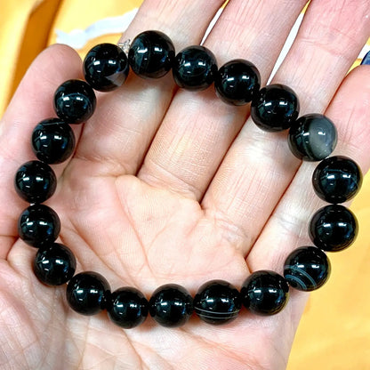 Musta raita - akaatti - Rannekoru - Kohottaa kehon värähtelyä, tuo hyvät yöunet - Valkoisen Liekin Voima