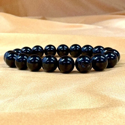 Musta turmaliini - Rannekoru - Suojeleva koru, joka imee negatiivisuuden ja tuo rauhan - Valkoisen Liekin Voima