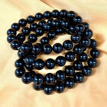 Musta turmaliini - Rannekoru - Suojeleva koru, joka imee negatiivisuuden ja tuo rauhan - Valkoisen Liekin Voima