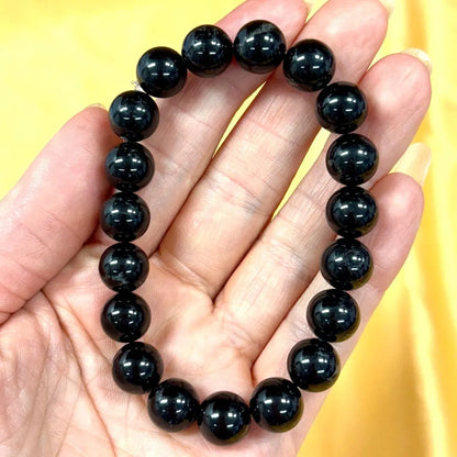 Musta turmaliini - Rannekoru - Suojeleva koru, joka imee negatiivisuuden ja tuo rauhan - Valkoisen Liekin Voima