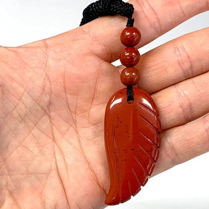 Punainen jaspis - Enkelinsiipikaulakoru - Elinvoimaa, itseluottamusta ja rauhaa - Valkoisen Liekin Voima