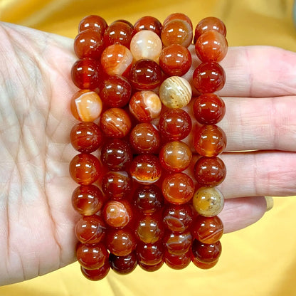 Punainen raita - akaatti - Rannekoru - Rauhoittaa, nostaen oman voiman esiin - Valkoisen Liekin Voima