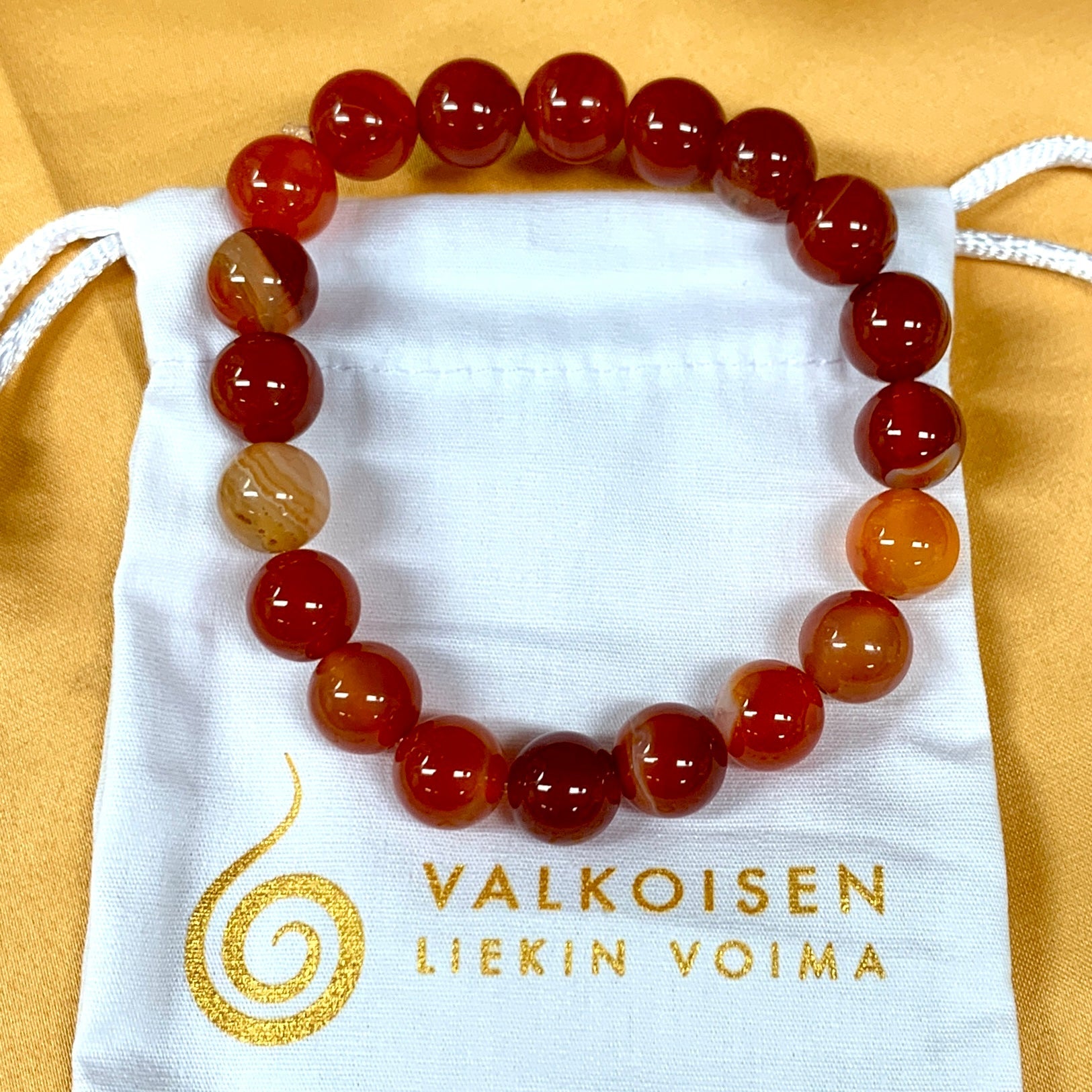 Punainen raita - akaatti - Rannekoru - Rauhoittaa, nostaen oman voiman esiin - Valkoisen Liekin Voima