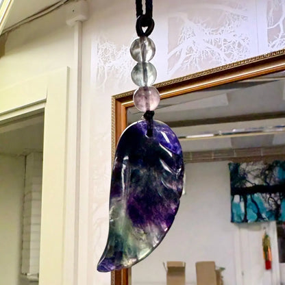 Purppurafluoriitti - Enkelinsiipikaulakoru - Avaa runsaudelle ja vapauttaa riippuvuuksista - Valkoisen Liekin Voima