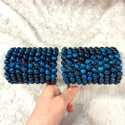 Sininen Tiikerinsilmä - Rannekoru - Vahvistaa energiavirtauksia kehossa - Valkoisen Liekin Voima