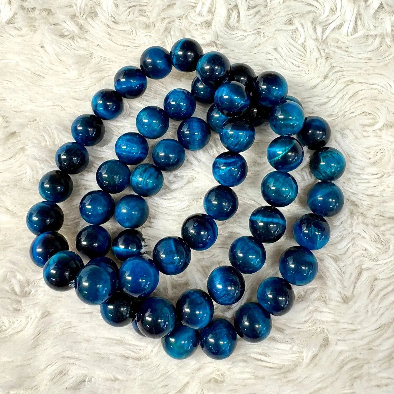 Sininen Tiikerinsilmä - Rannekoru - Vahvistaa energiavirtauksia kehossa - Valkoisen Liekin Voima