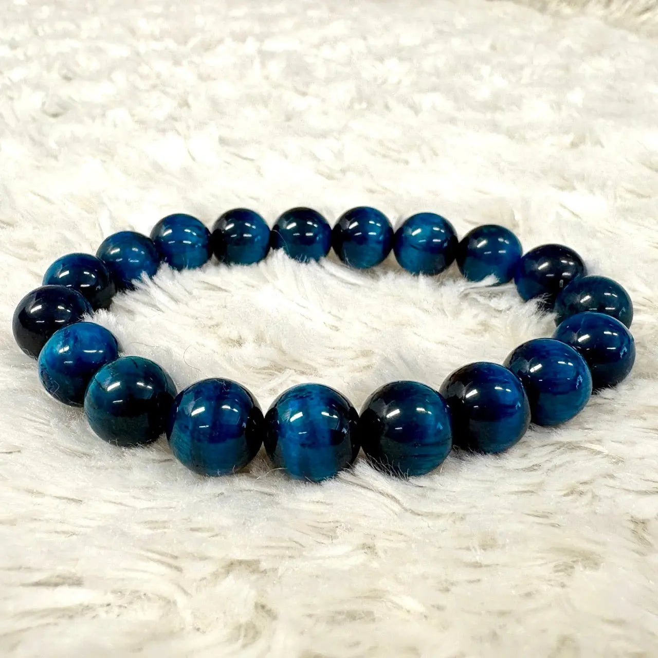 Sininen Tiikerinsilmä - Rannekoru - Vahvistaa energiavirtauksia kehossa - Valkoisen Liekin Voima