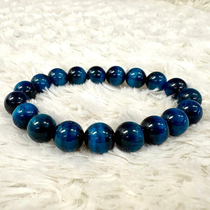 Sininen Tiikerinsilmä - Rannekoru - Vahvistaa energiavirtauksia kehossa - Valkoisen Liekin Voima