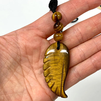 Tiikerinsilmä - Enkelinsiipikaulakoru - Terveyttä, ymmärrystä ja sisäistä voimaa - Valkoisen Liekin Voima